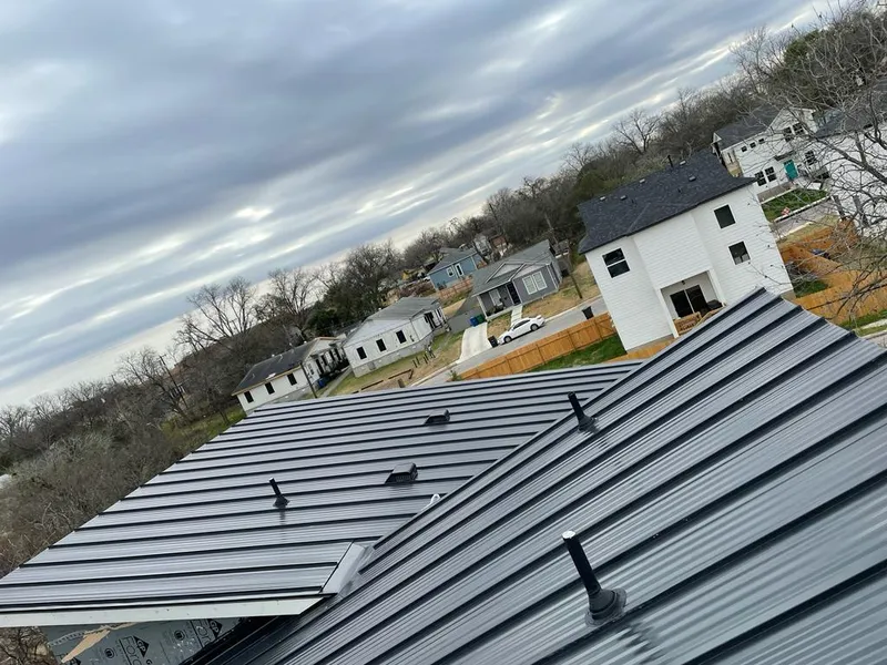 Standing seam metal roof panels with vents for Skylight Repair in Wilson